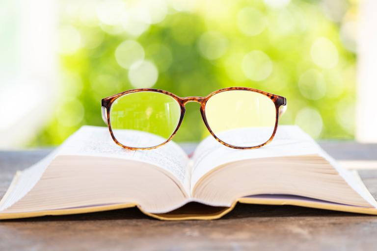 Glasses on book