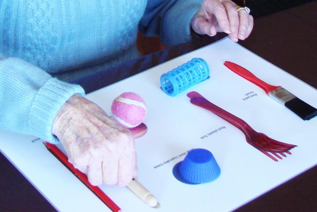 Hands working on matching activity