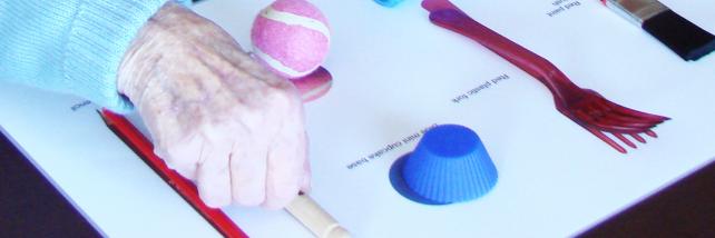 Hands working on matching activity